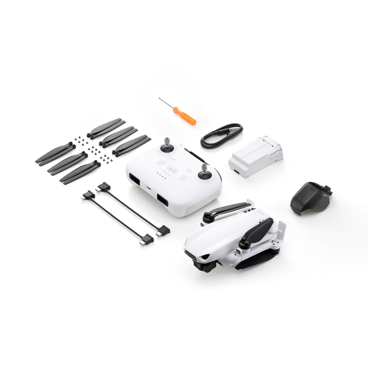 SKYROVER S1 kit with white drone, controller, one battery, spare propellers, cables, screwdriver and gimbal cover.